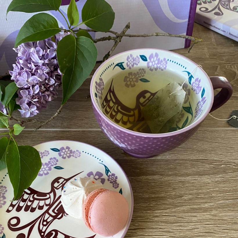 Purple mug with indigenous design.