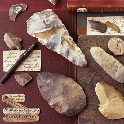 A collection of arrowheads and a book on a table at the Canadian Museum of History in Ottawa.