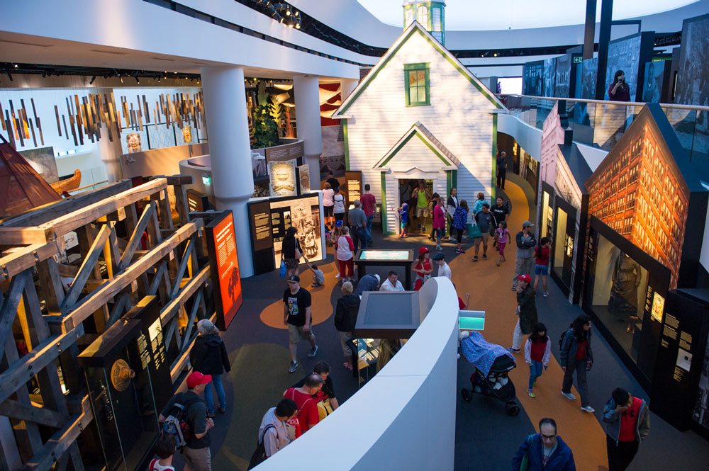 The Canadian Museum of History in Ottawa is bustling with people walking around.