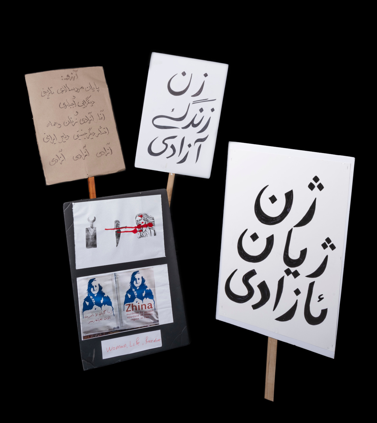 The Museum collected a variety of protest signs from “Woman, Life, Freedom” protests held across Canada.